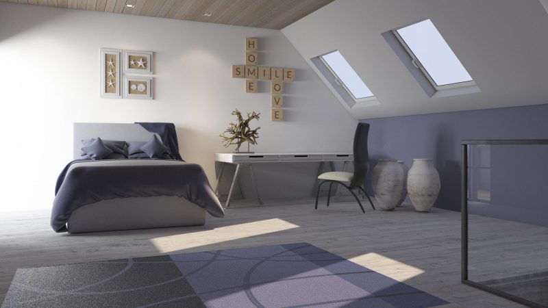 Stylish converted loft bedroom with Velux roof windows, double bed and home office area