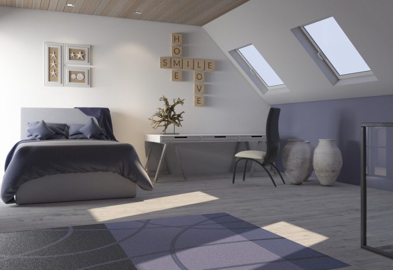 Stylish converted loft bedroom with Velux roof windows, double bed and home office area