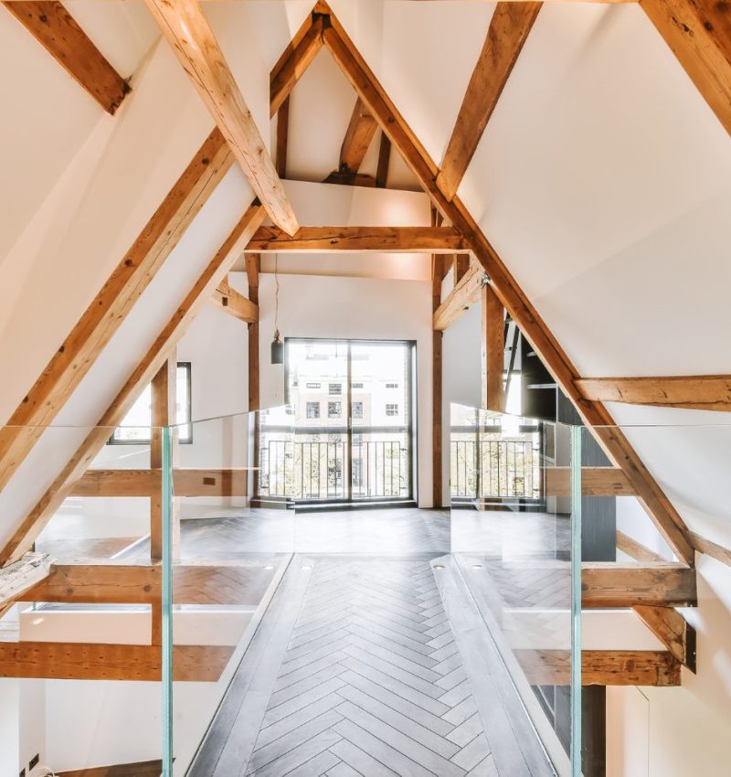 Interior view of loft conversion showing timber A-frame roof structure