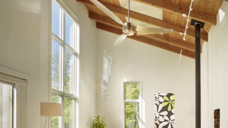 Converted loft room with dormer window and white rendered walls