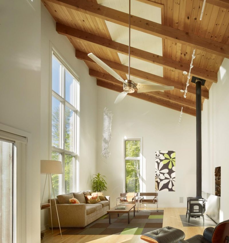 Converted loft room with dormer window and white rendered walls